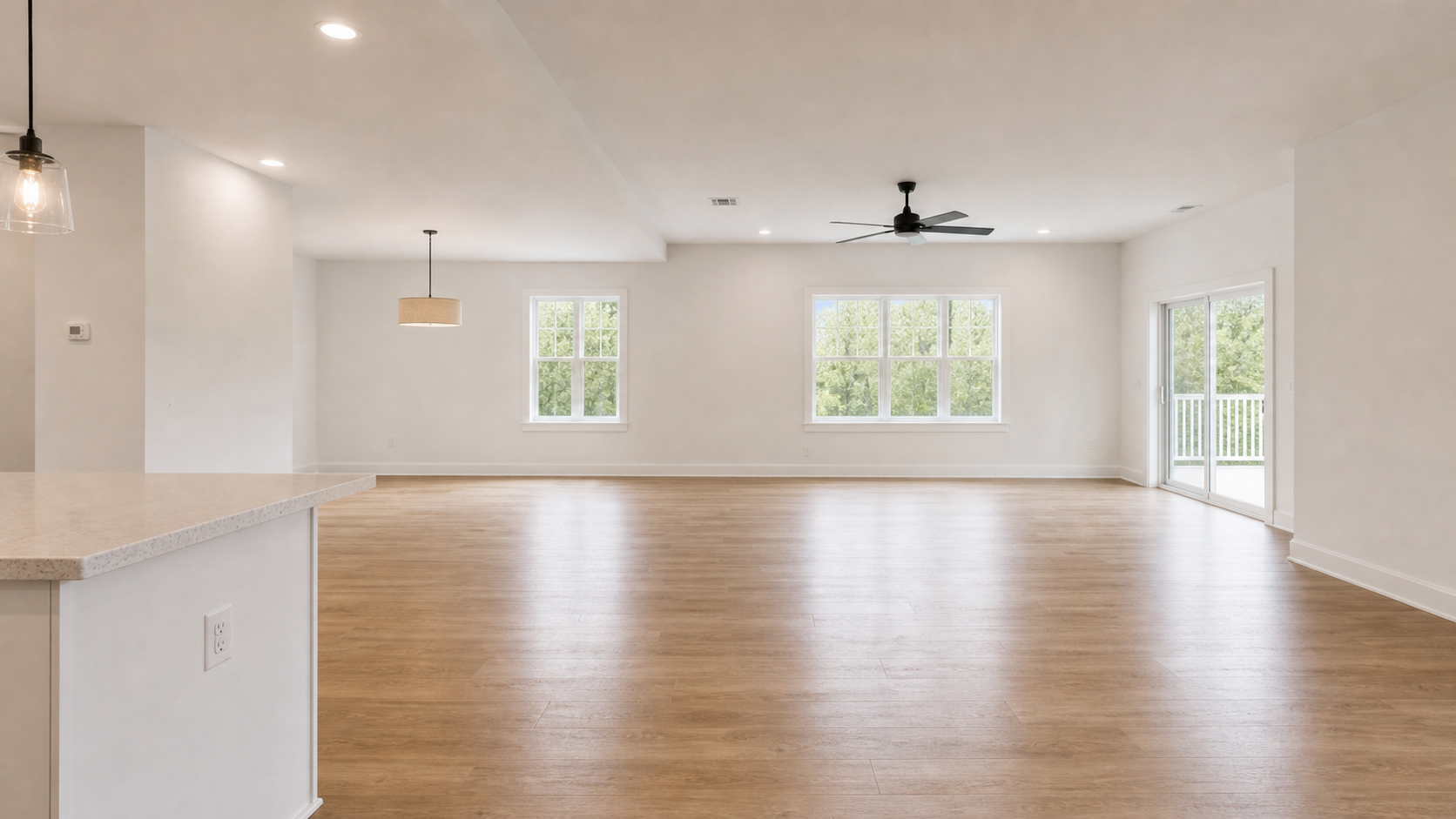 Open-concept living space before virtual staging